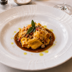 Gnocchi di Patate Ripieni di Cassoeula, Crema di Verza e Ostriche